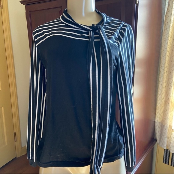 Adorable and soft knit top with striped tie and striped sleeves. Classic look. - Picture 2 of 6